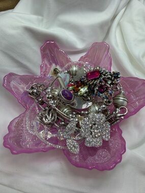 Vintage Jewelry in a Pink Turkish Carnival Glass bowl